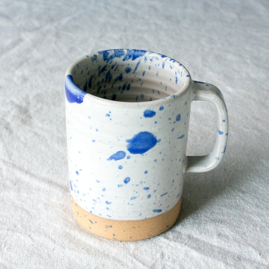 http://neighborlyshop.com/cdn/shop/products/handmade-ceramic-12-ounce-mug-cobalt-blue-splatter.jpg?v=1629905912