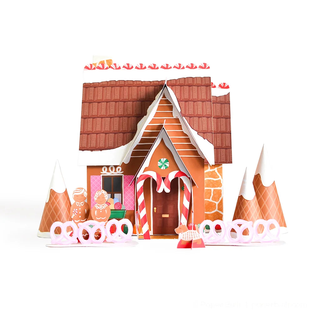 http://neighborlyshop.com/cdn/shop/products/paper-gingerbread-house-diy-kit-dollhouse-built.webp?v=1670941916