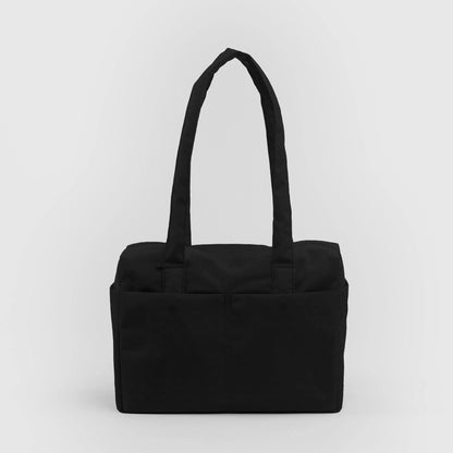 Black nylon tote bag on a light gray background