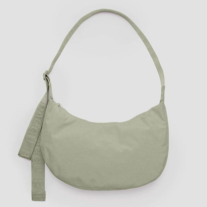 Green shoulder bag on a light gray background