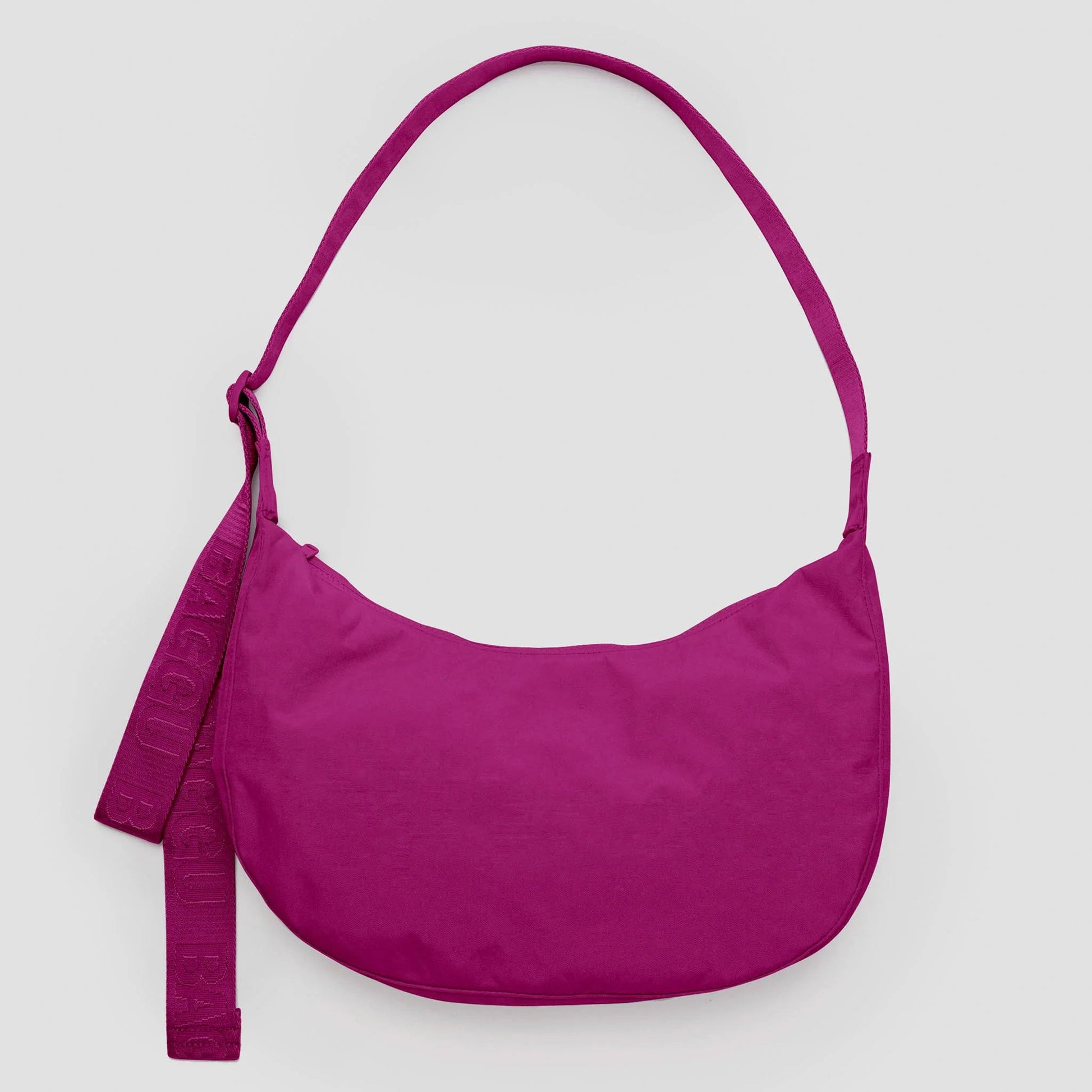 Pink shoulder bag on a light gray background