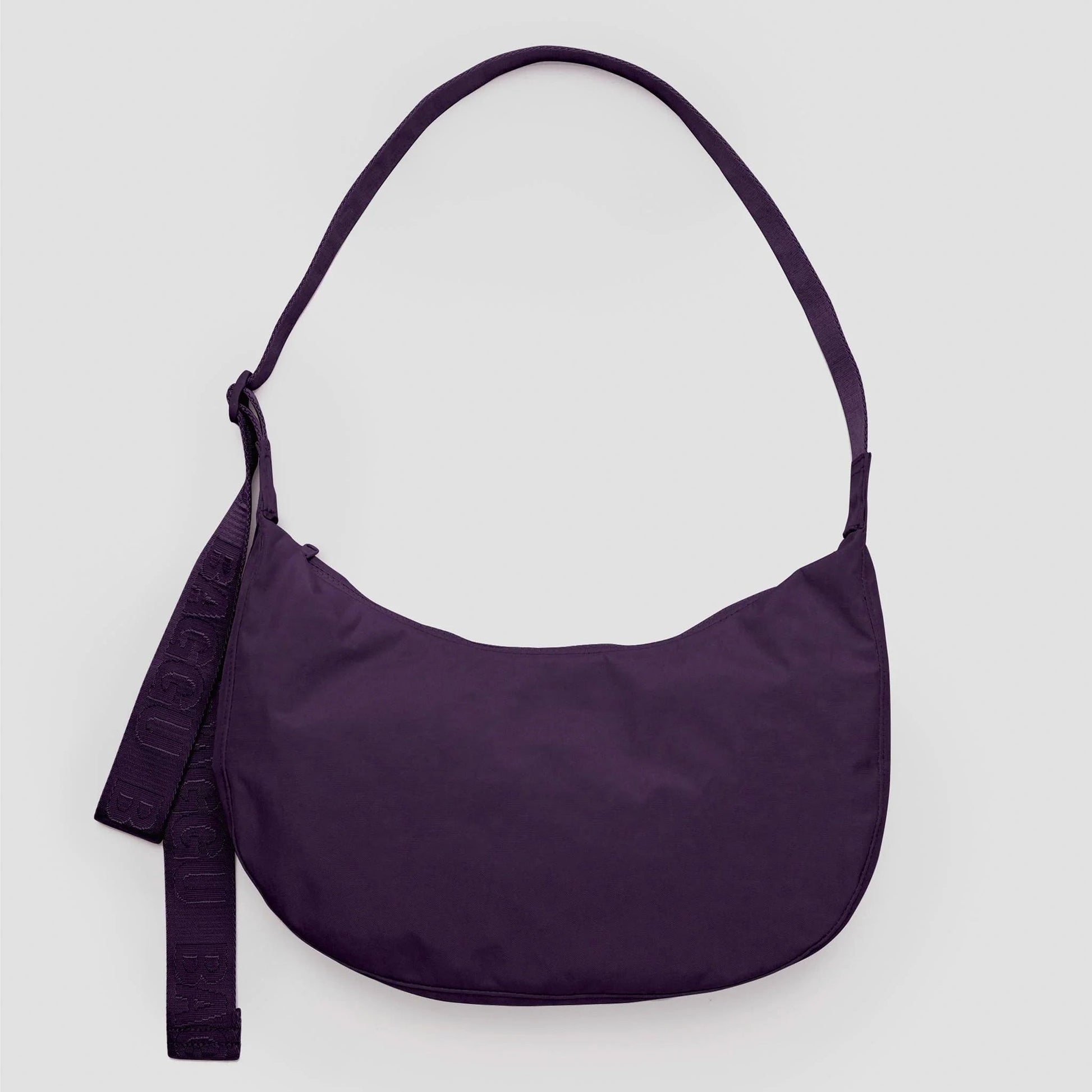 Purple shoulder bag on a light gray background