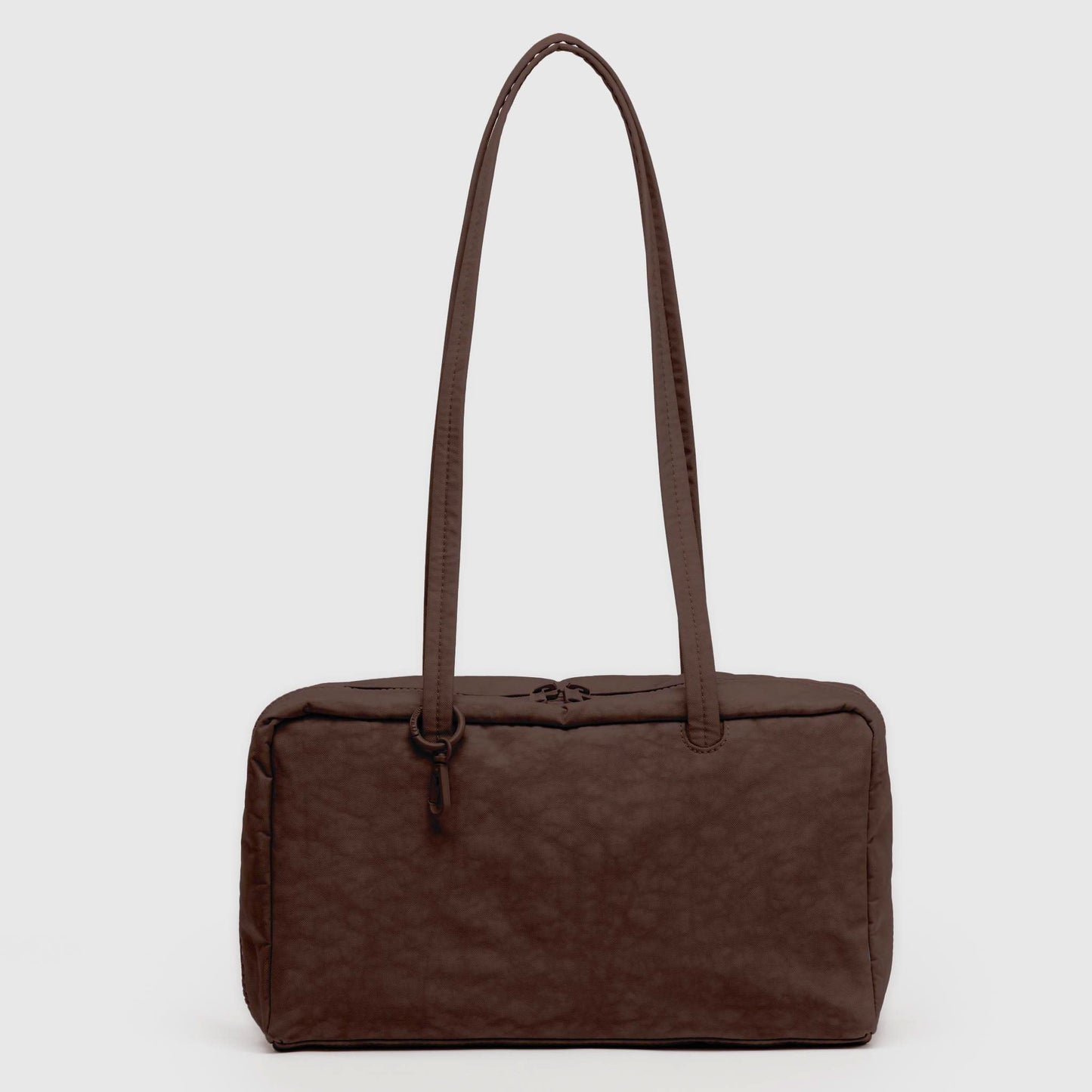 Brown nylon handbag with a strap on a light gray background