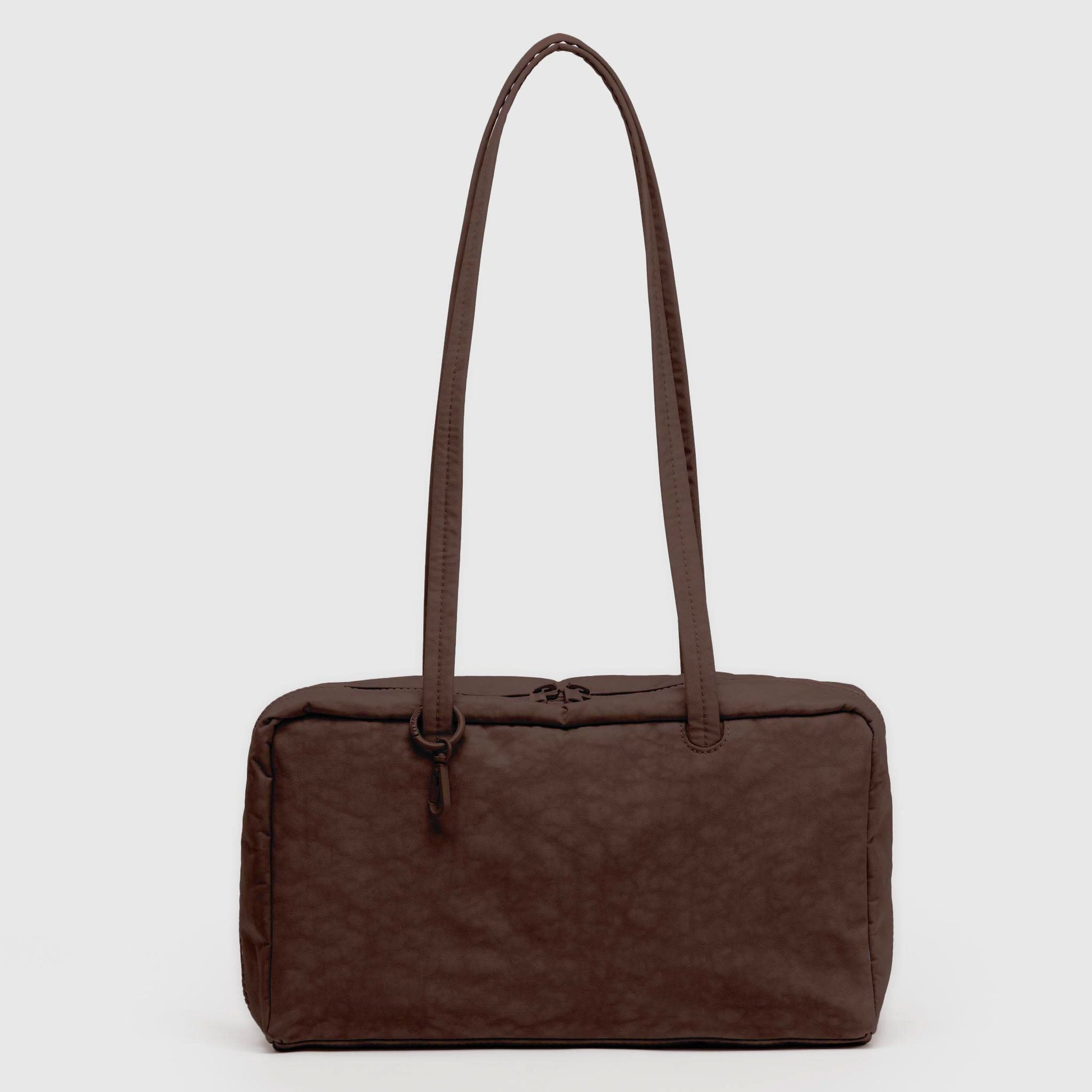 Brown nylon handbag with a strap on a light gray background