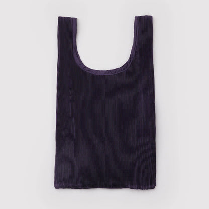 Purple pleated nylon tote on a light gray background