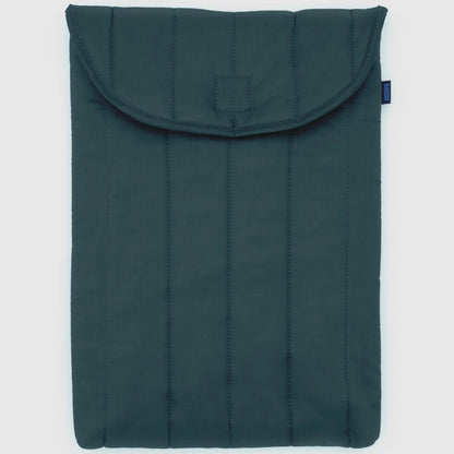 Dark green quilted laptop sleeve on a light gray background