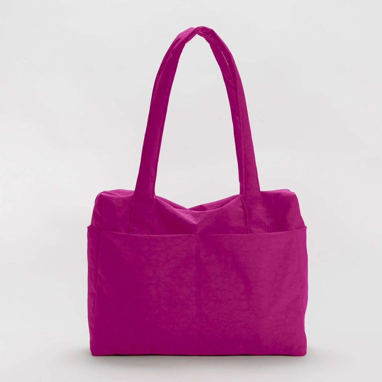 Fuchsia nylon tote bag on a light gray background