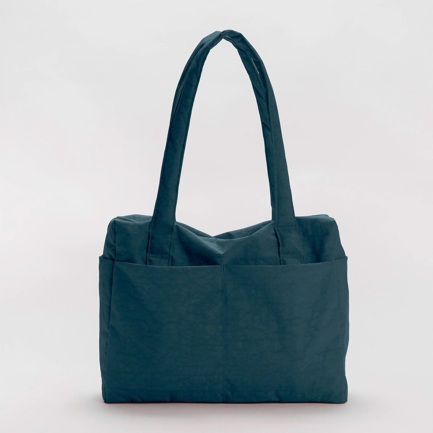Teal nylon tote bag on a light gray background