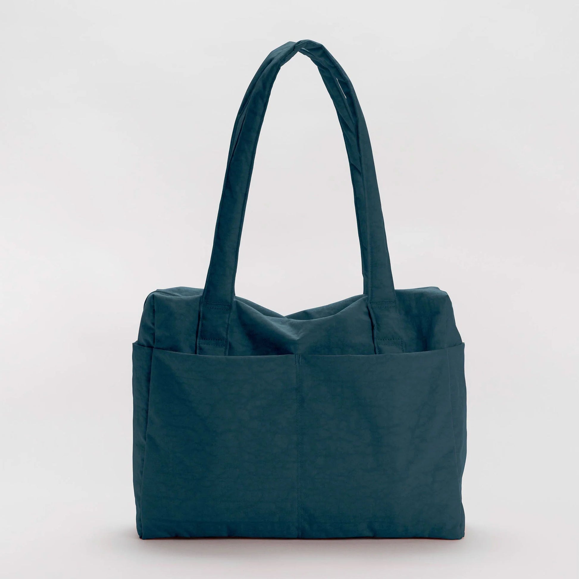 Teal nylon tote bag on a light gray background