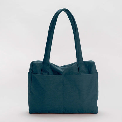 Teal nylon tote bag on a light gray background