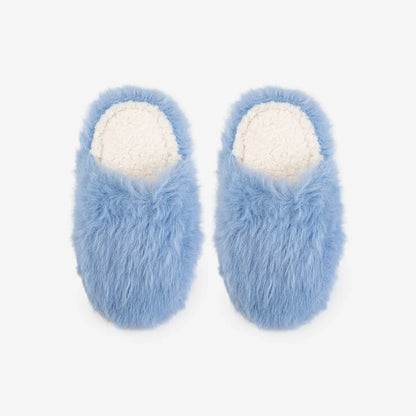 Pair of blue fuzzy slippers with white fleece interior on a white background