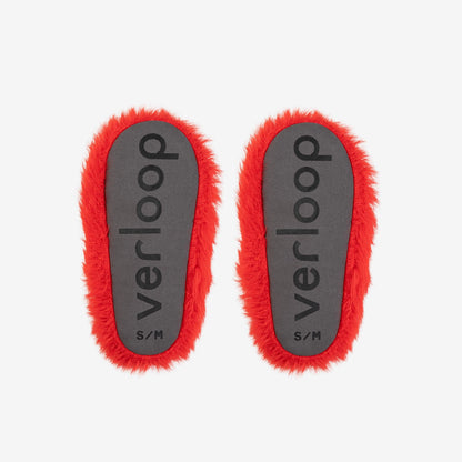 Two red slipper bottoms on a white background