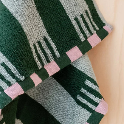 Close-up of a green striped towel.