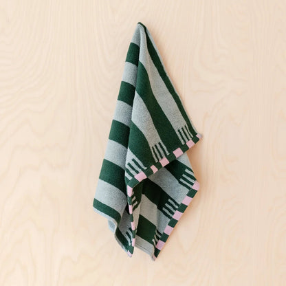 Striped green hand towel.