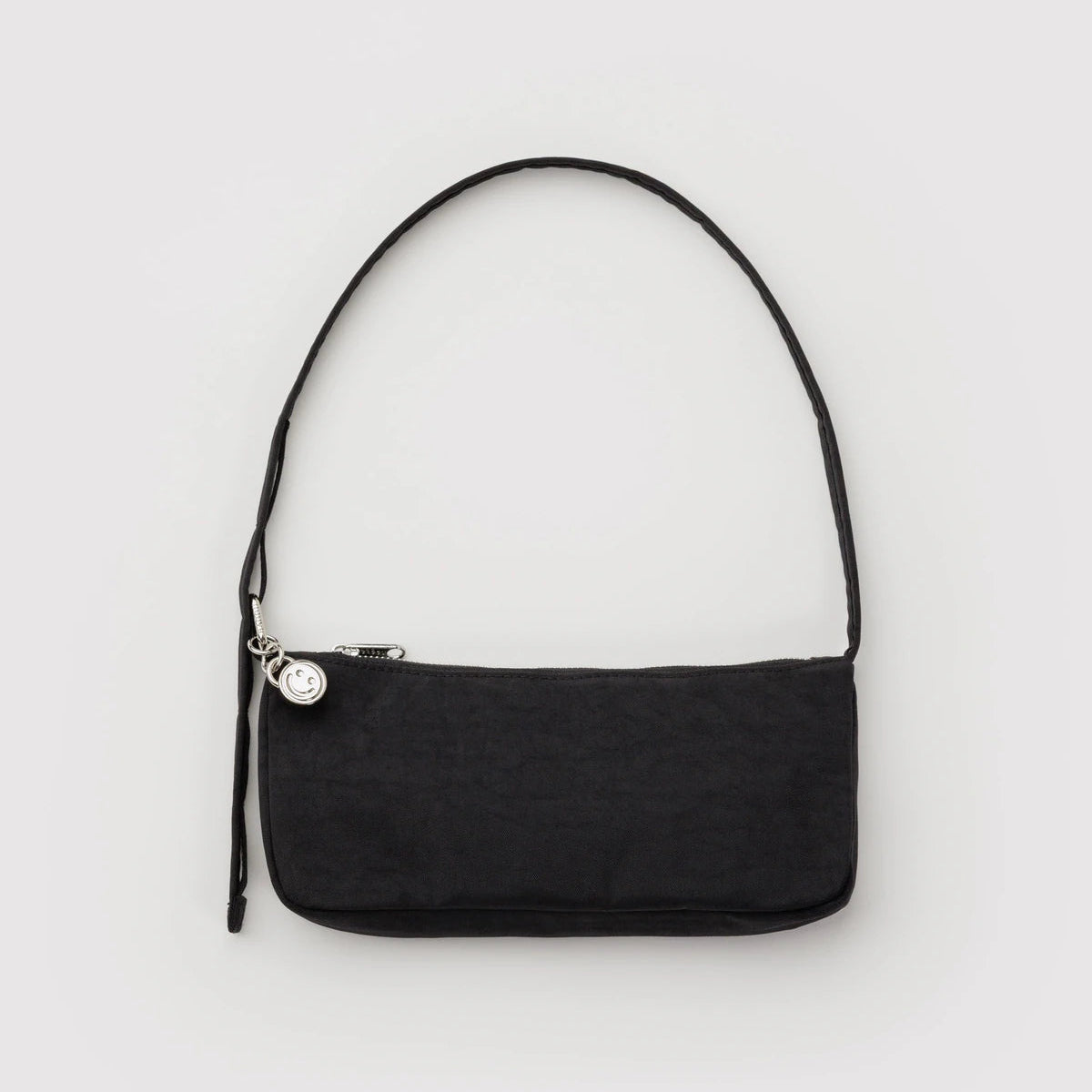 Black shoulder bag on a light gray background