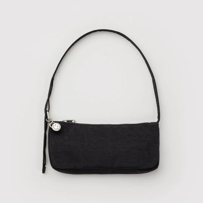 Black shoulder bag on a light gray background