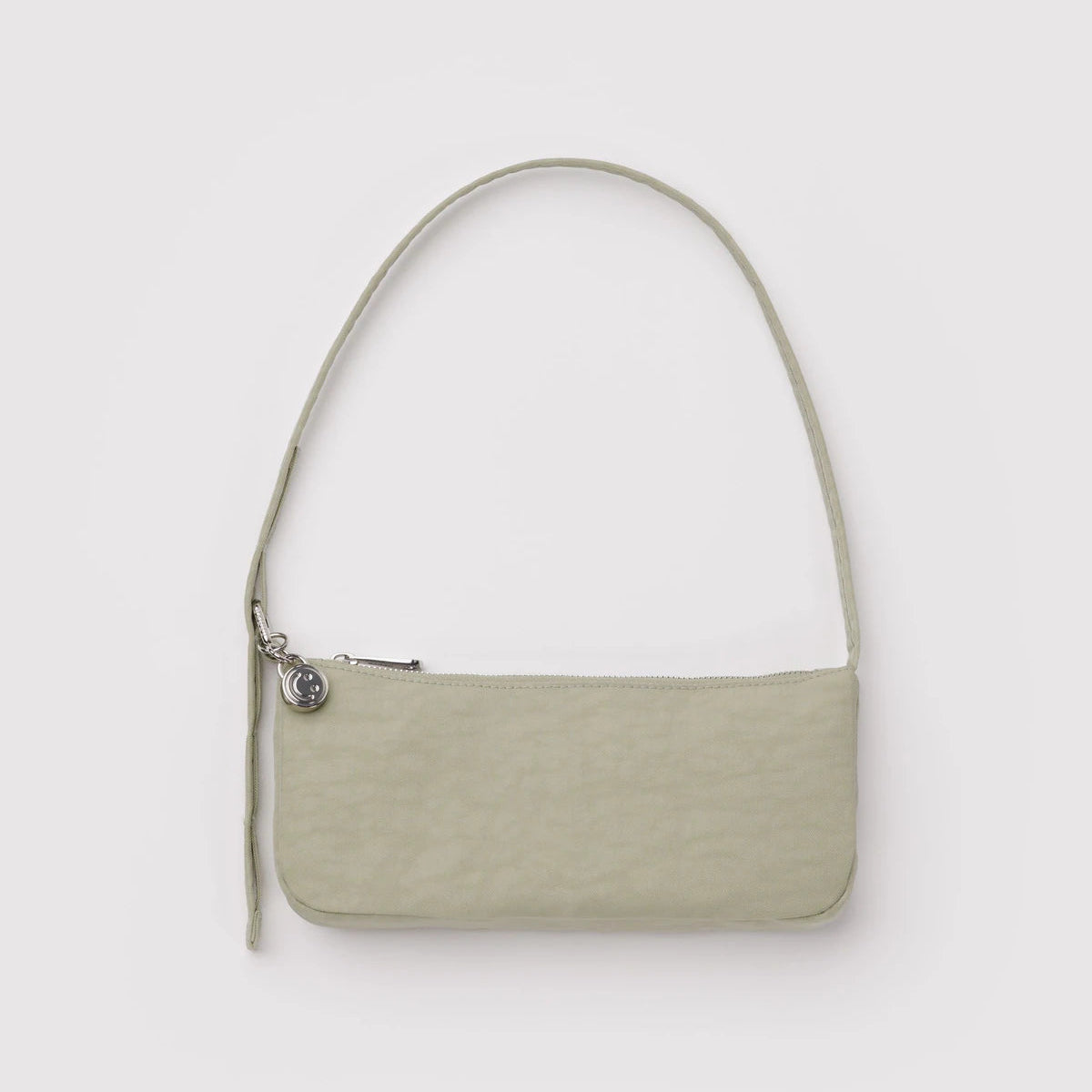 Light green handbag on a light gray background