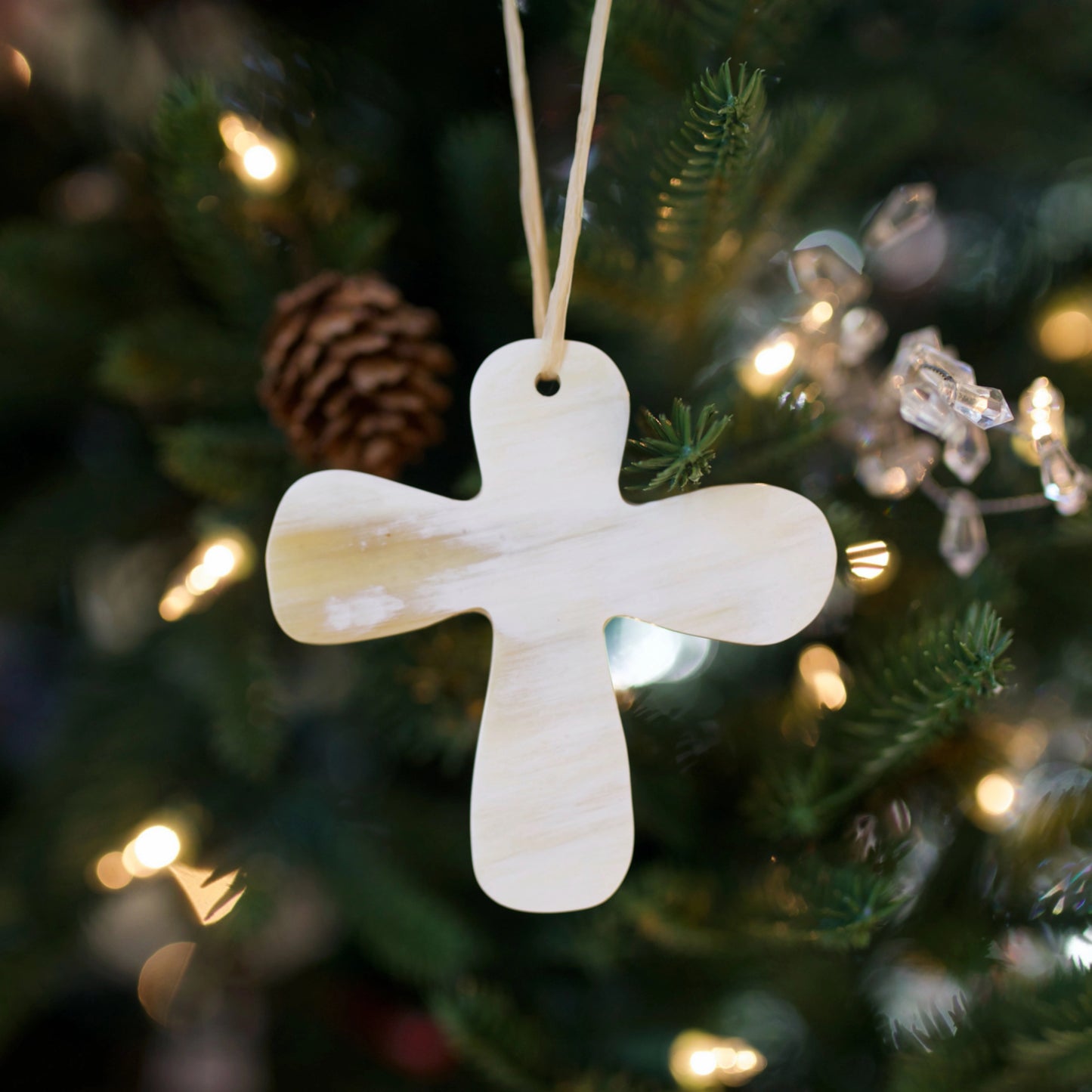 Cross Carved Cow Horn Holiday Ornament