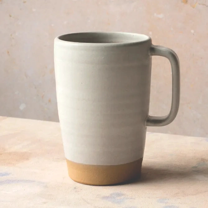 https://neighborlyshop.com/cdn/shop/products/handmade-ceramic-16-ounce-latte-mug-matte-white.webp?v=1677167016&width=1445
