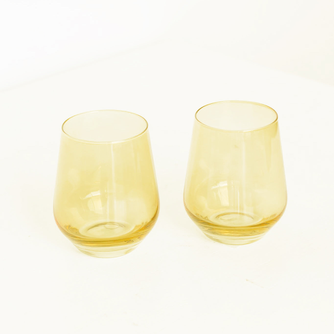 https://neighborlyshop.com/cdn/shop/products/yellow-stemless-wine-glass-handblown-estelle-colored-set.jpg?v=1619441909&width=1445